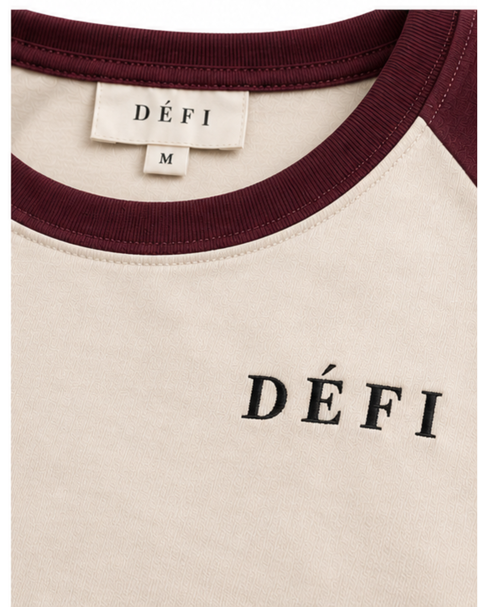 Défi Ballpark men's raglan T-shirt in cream white and deep burgundy, neckline and logo close-up